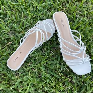 White strappy sandals